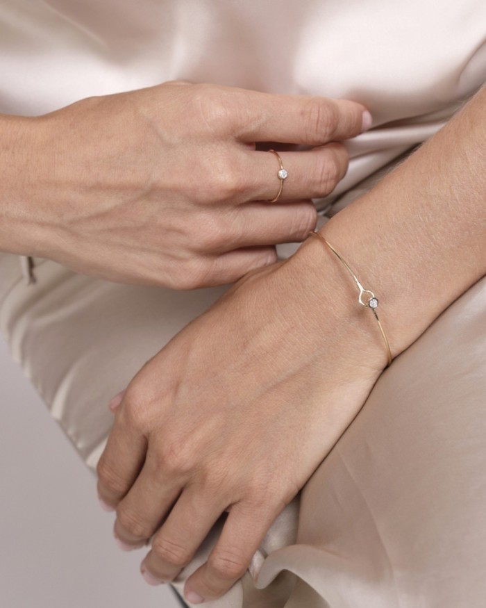 Starres Armband aus 18-karätigem Gold mit rundem Diamantmotiv | LECARRE