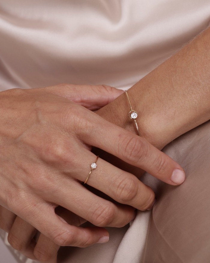 18k guldarmband med runt diamantmotiv | LECARRE