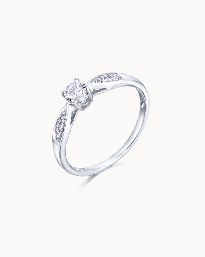 Solitaire-ring med fire klor og sidediamanter | LECARRE